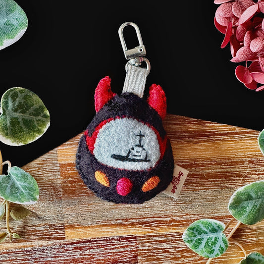 Bijou de sac: « Compagnon électronique oublié »